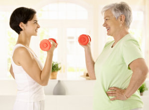 Elderly with personal trainer